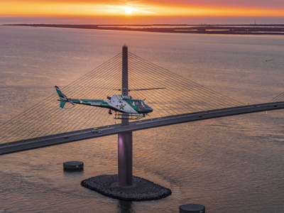 PCSO Helicopter in front of Skyway Bridge